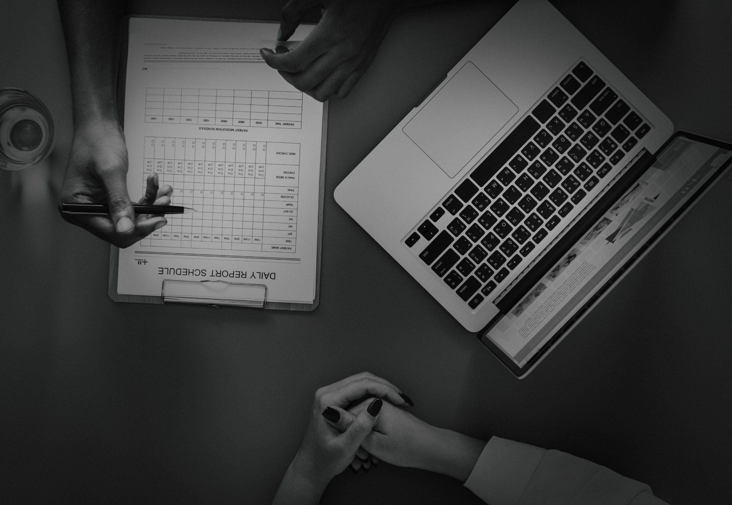 aerial view doctor writing patient daily report checklist 1 1 scaled