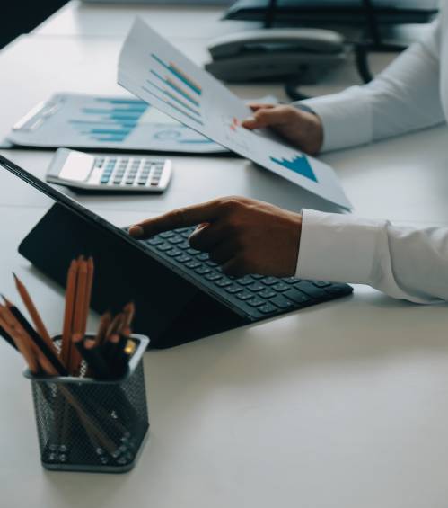 close up business team analyzing income charts graphs with modern laptop computer business analysis strategy concept 1